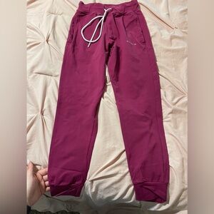 NVGTN joggers in the color berry. Only worn a handful of times!